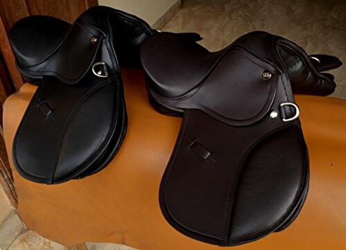 Black and brown horse saddles on display