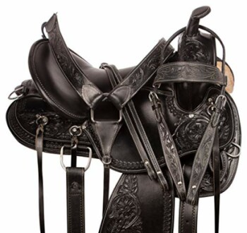 Black leather horse saddle with intricate floral designs.